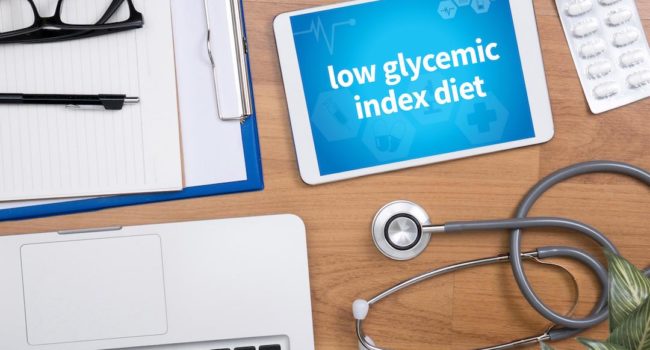 low glycemic index diet Professional doctor use computer and medical equipment all around, desktop top view
